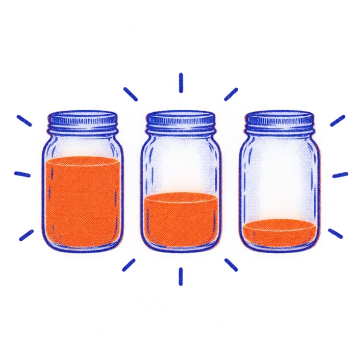Three jars filling with orange